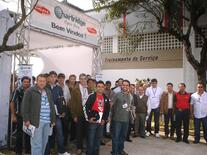 A group of people at the Hartridge stand at Delphi