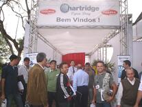 A group of people at the Hartridge stand at Delphi