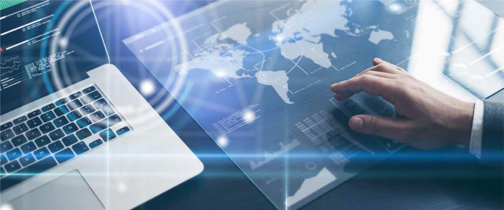 laptop keyboard and hand over world map global coverage