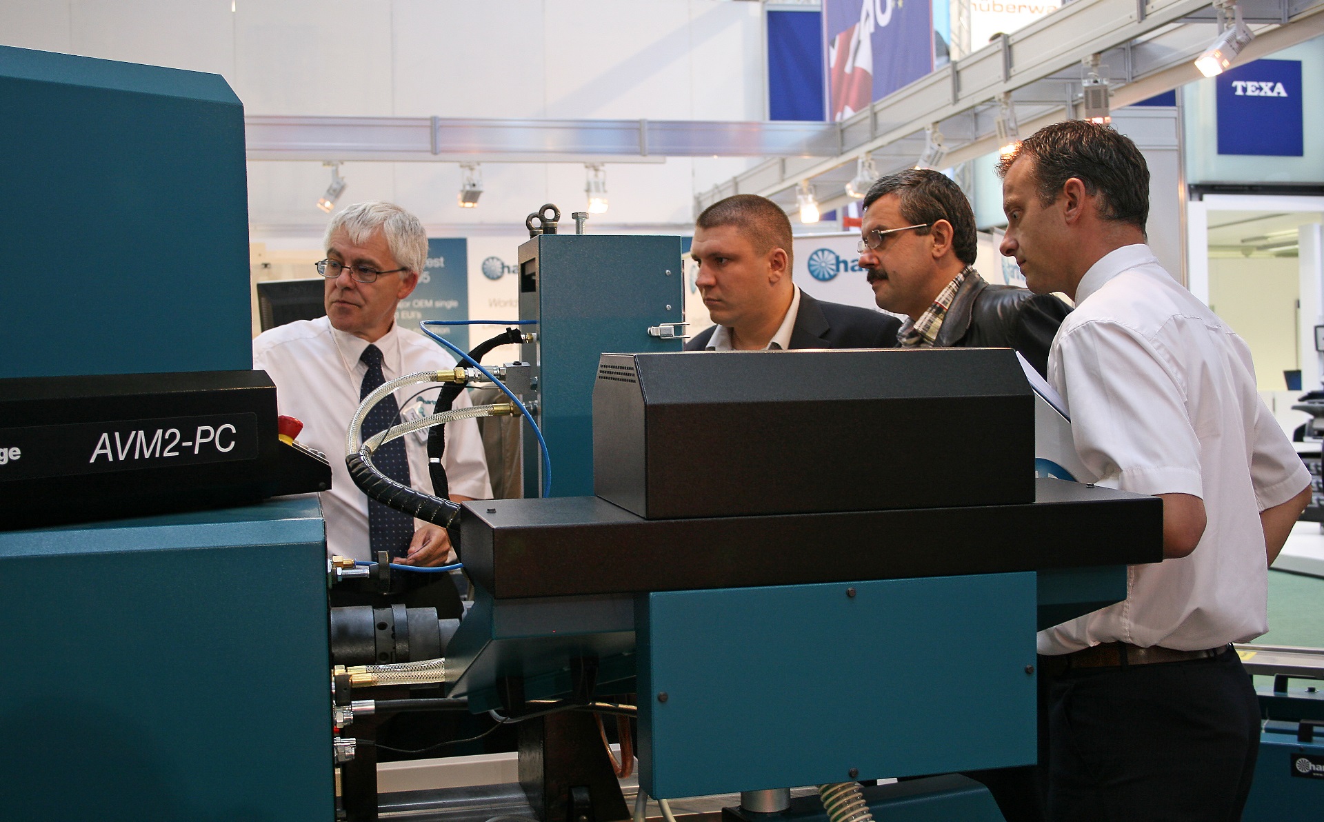 Group of engineer observing test bench