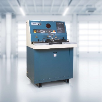 blue cummins pt injector test bench in white room